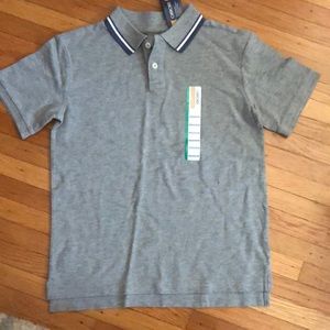 NWT boys size medium gray short sleeve polo with blue and white trim on collar